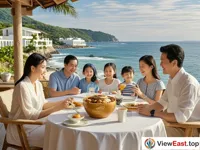 In a seaside vacation villa, the family is enjoying a leisurely vacation. A portion of Buddha Jumps over the Wall is placed on an outdoor dining table. The sea breeze is blowing gently. Everyone is enjoying the beautiful sea view while tasting the delicious food.