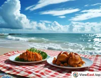 Under the blue sky and white clouds by the seaside, a picnic mat with plaid cloth lays out a plate of Hainan Wenchang Chicken, with the sea breeze gently blowing, bringing waves of tempting aroma.