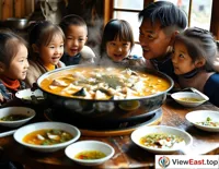 A family gathers around the dining table, with a large pot of fragrant Guizhou Sour Soup Fish at the center, children eagerly reaching for pieces of fish.