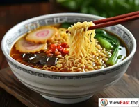  In the photography studio, the photographer is capturing a beautifully styled bowl of Lanzhou Hand-Pulled Noodles, focusing on the chewiness of the noodles and the clarity of the broth.