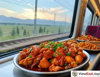 In the dining car of the train, passengers are tasting Xinjiang big plate chicken. Outside the window is a beautiful scenery, adding a special taste to the journey.