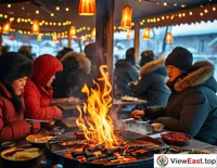 In the winter of the Northeast, inside a barbecue restaurant, customers are gathered around the warm charcoal fire, enjoying hot barbecue dishes.