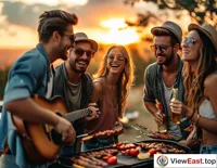  A group of young people at an outdoor barbecue party, enjoying the food while admiring the sunset's afterglow.