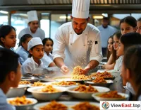 A chef is demonstrating the process of making Zhajiang Noodles in a cooking class, with students gathered around, watching intently.
