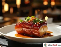 In an upscale restaurant, the sheen of Braised Pork Belly on fine tableware looks even more tempting under soft lighting.