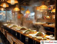 In a cozy restaurant, the aroma of Hunan spicy fish head wafts with steam, whetting appetites.