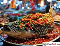 At a bustling night market, the spicy scent of Hunan fish head entices passersby to stop and taste.