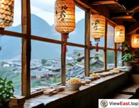 In a mountain town in Yunnan, a small shop with Cross-Bridge Rice Noodles lanterns in the window invites passing travelers to try their specialty.