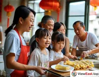 At a family gathering in Guangdong, family members make Cheong fun together, with children eagerly tasting their homemade skill.