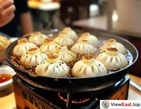 At a Shanghai breakfast stall, soup dumplings sizzle in hot oil, filling the air with an irresistible aroma that tempts people to stop and buy.