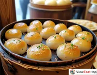 In a time-honored Shanghai soup dumpling shop, the first pot of freshly baked soup dumplings is just out, with a golden bottom emitting an enticing aroma.