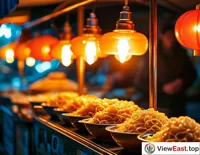 At a Hubei snack night market, the bright lights of hot dry noodle stalls attract foodies out for a late-night meal.