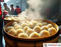 At a Zhejiang breakfast stall, steamers of buns emit steam in the morning sunlight, providing energy and warmth for early risers.