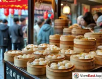 By West Lake in Hangzhou, a line forms at a time-honored shop, with customers waiting for the fragrant local steamed buns.