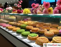 In a Yunnan airport lounge, a specialty store's window displays various flavored flower cakes, becoming a must-buy souvenir for travelers.