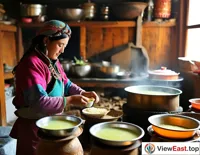 In a Tibetan household's kitchen, a mother is cooking traditional Tibetan dishes with highland barley wine, filling the air with its aroma.