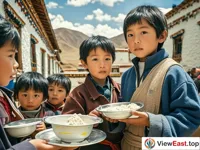 In a rural Tibet primary school, children line up for tsampa at lunchtime, their eyes filled with anticipation.