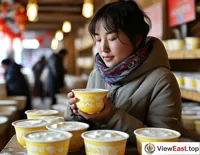 In a Qinghai yogurt shop, customers savor freshly made yogurt, cool and refreshing.