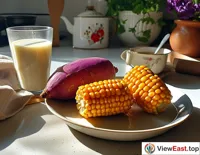 Steamed corn, sweet potatoes, and purple potatoes in a morning kitchen, emitting an enticing aroma, next to a cup of fresh soy milk.