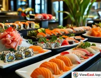 Jellyfish salad at a hotel buffet, next to a variety of exquisite sushi and sashimi.