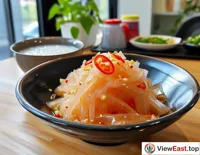Jellyfish salad with a bowl of white porridge during office lunchtime, simple yet delicious.