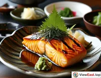 Grilled salmon with Japanese sauce and pickles at a refined Japanese restaurant, showcasing the delicacy and flavor of Japanese cuisine.