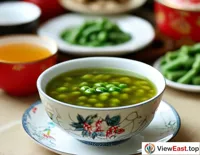 A bowl of mung bean soup as a refreshing treat at a festive celebration, bringing tranquility to a lively gathering.