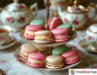 At a fashionable afternoon tea, French macarons are arranged on delicate porcelain plates, complementing the elegant tea set and creating a romantic French ambiance.