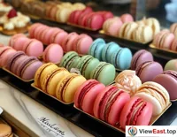 Customers choose from a variety of French macarons in an exquisite patisserie, each color representing a different flavor and mood.