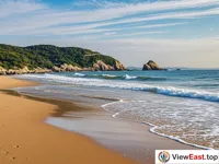 The Hundred Steps Beach in Putuoshan, a golden sandy beach with gentle waves.