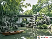 The lake rocks and verdant bamboo of the Couple's Garden Retreat in Suzhou's gardens.