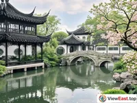 The waterside pavilions and bridges of the Master of Nets Garden in Suzhou's gardens.