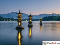 The moonlit reflection of the Three Ponds Mirroring the Moon at West Lake.
