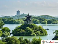 The lush greenery of the Small Golden Hill at Slender West Lake in Yangzhou.