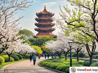 The spring atmosphere of Wuhan Yellow Crane Tower, an ancient building amidst a sea of flowers.