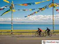 Cycling along Qinghai Lake with Prayer Flags